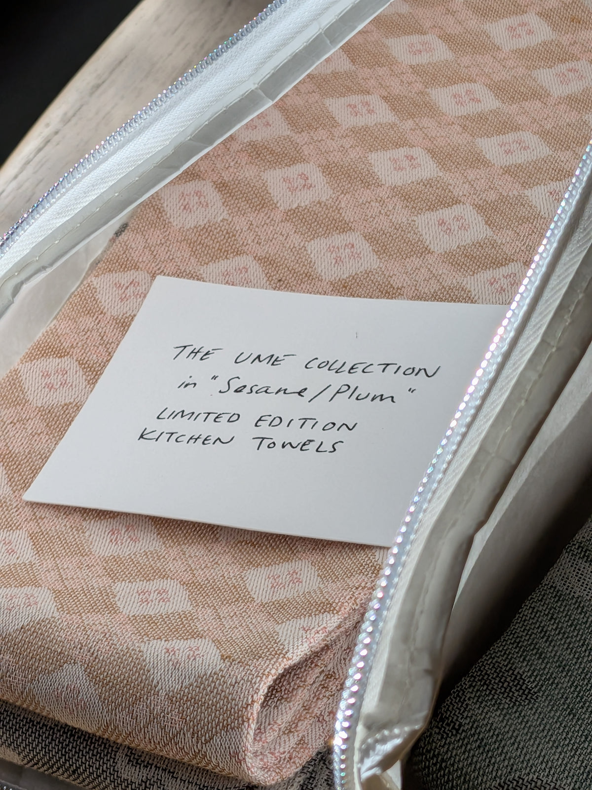 Sesame diamond kitchen towel in the Feronia zip pouch with a handwritten Ume Collection limited edition card